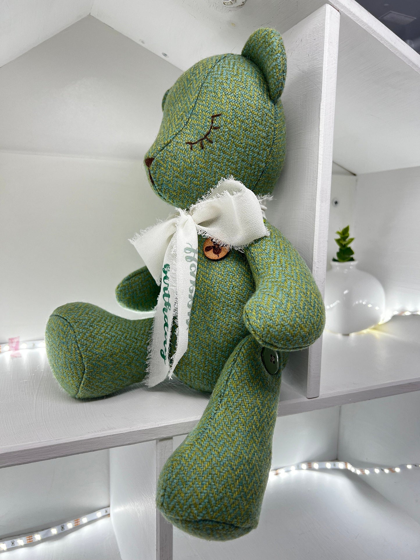 Adorable Handmade Teddy Bear in Green Harris Tweed fabric - cuddly with closed eyes.