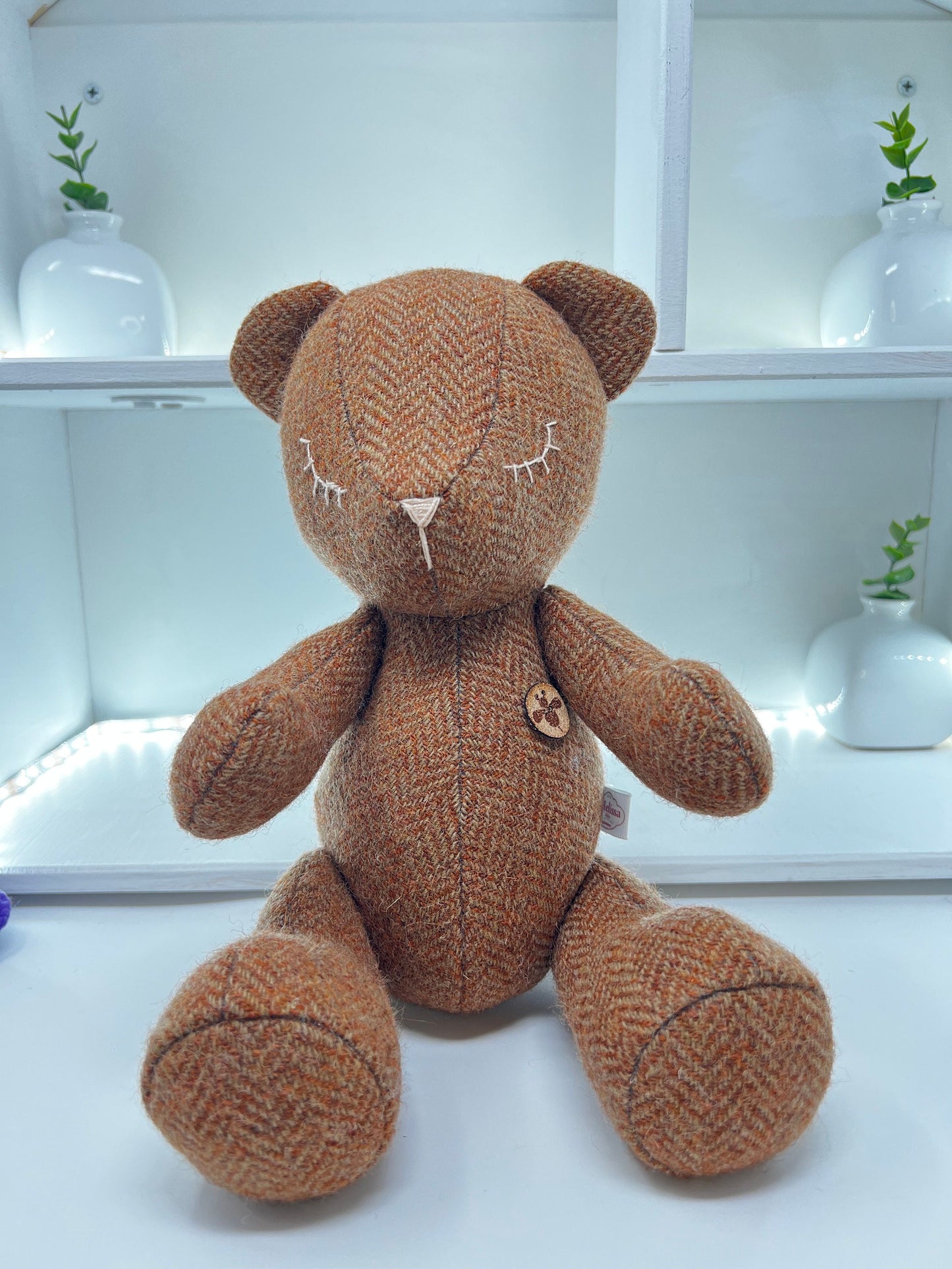 Adorable Handmade Teddy Bear in Camel Harris Tweed fabric - cuddly with closed eyes.